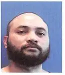 Criminal record photo of AYUYU WILLIE BABAUTA